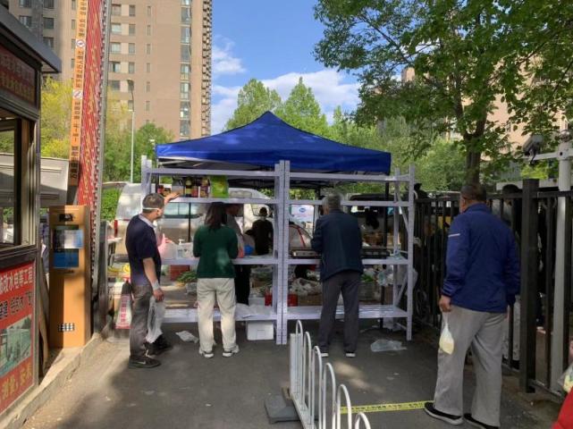 打通最后一百米 农光里市场商户保供管控小区