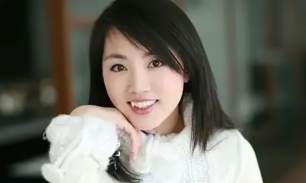 天气预报主持杨丹,事业爱情双丰收,中年得子,如今家庭幸福美满插图6