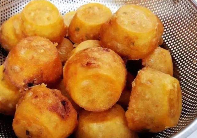 是早餐又是零食的——衢州油炸果衢州油炸果不仅是一道美味的早餐,还