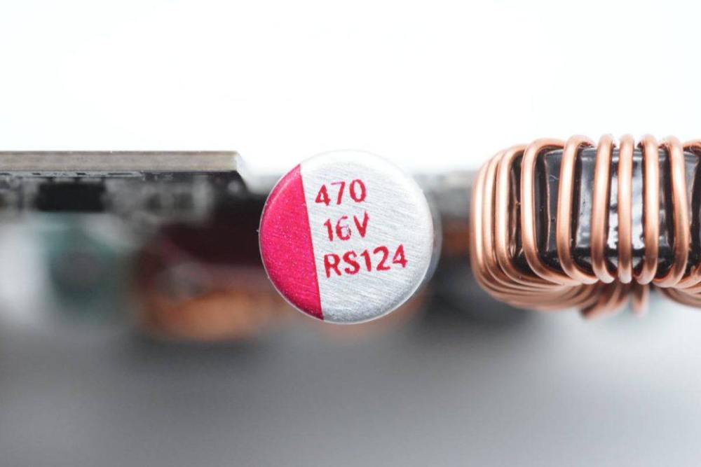 内置诚芯微cx8825降压芯片鹏元晟10w立式双线圈无线充电器拆解