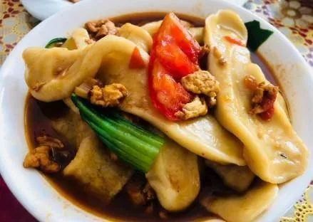 它是山西一种特别的面食"狗舌头"并非狗的舌头山西美食美不胜收中国
