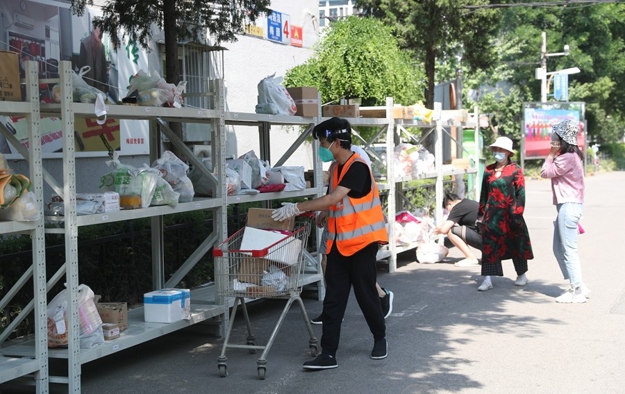 探访北京海淀梅园小区：“520”鲜花、蛋糕送进封管控区