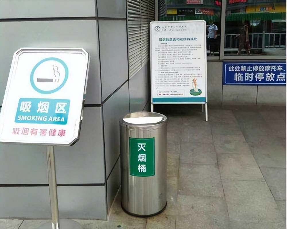 坐在禁烟标识下吸烟龙华卫监突击写字楼连罚6个