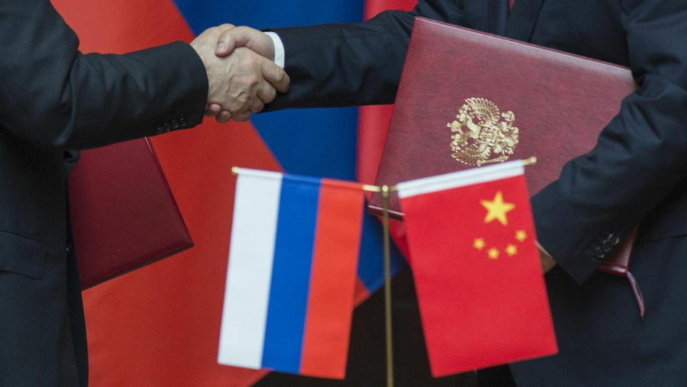 看不懂中俄背靠背的友谊美媒挑拨中国不是免费帮助俄罗斯
