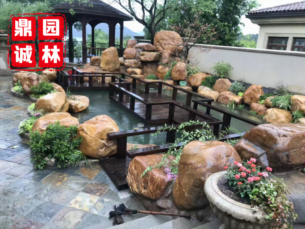 黄蜡石景观设计打造 小型黄蜡石组合设计假山造型石 腾讯新闻