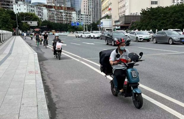 電動自行車亂闖紅燈廣州已試點安裝抓拍設備還有這些措施