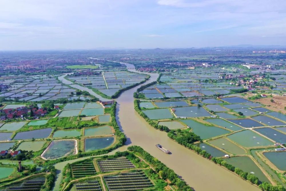 农业文化遗产看浙里湖州桑基鱼塘系统水乡生态景如画三生融合富万家