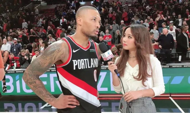 烤肉姐颜值很高,曾经作为espn记者,与达米安-利拉德建