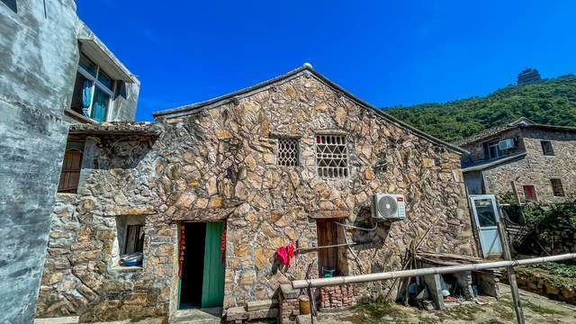 浙江洞头海边渔村,岁月洗涤后的虎皮石房,独具海岛民居特色_腾讯新闻