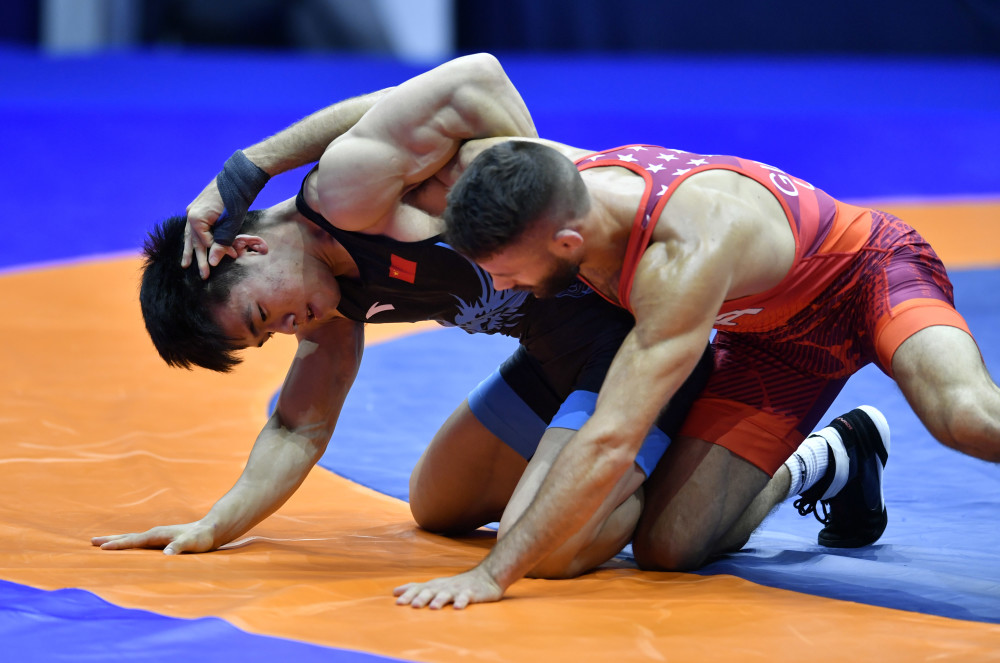 (体育)摔跤——世锦赛:邹万豪晋级男子自由式57公斤级铜牌决赛_腾讯