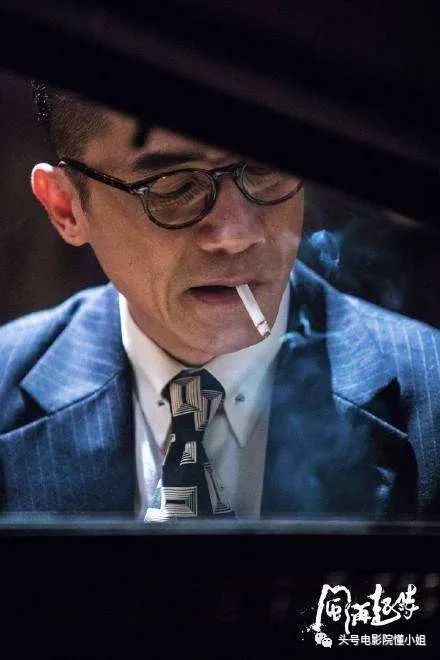 (梁朝伟的片中造型)另外两位,胖子韩(以韩森为原型)由周文健扮演,严洪