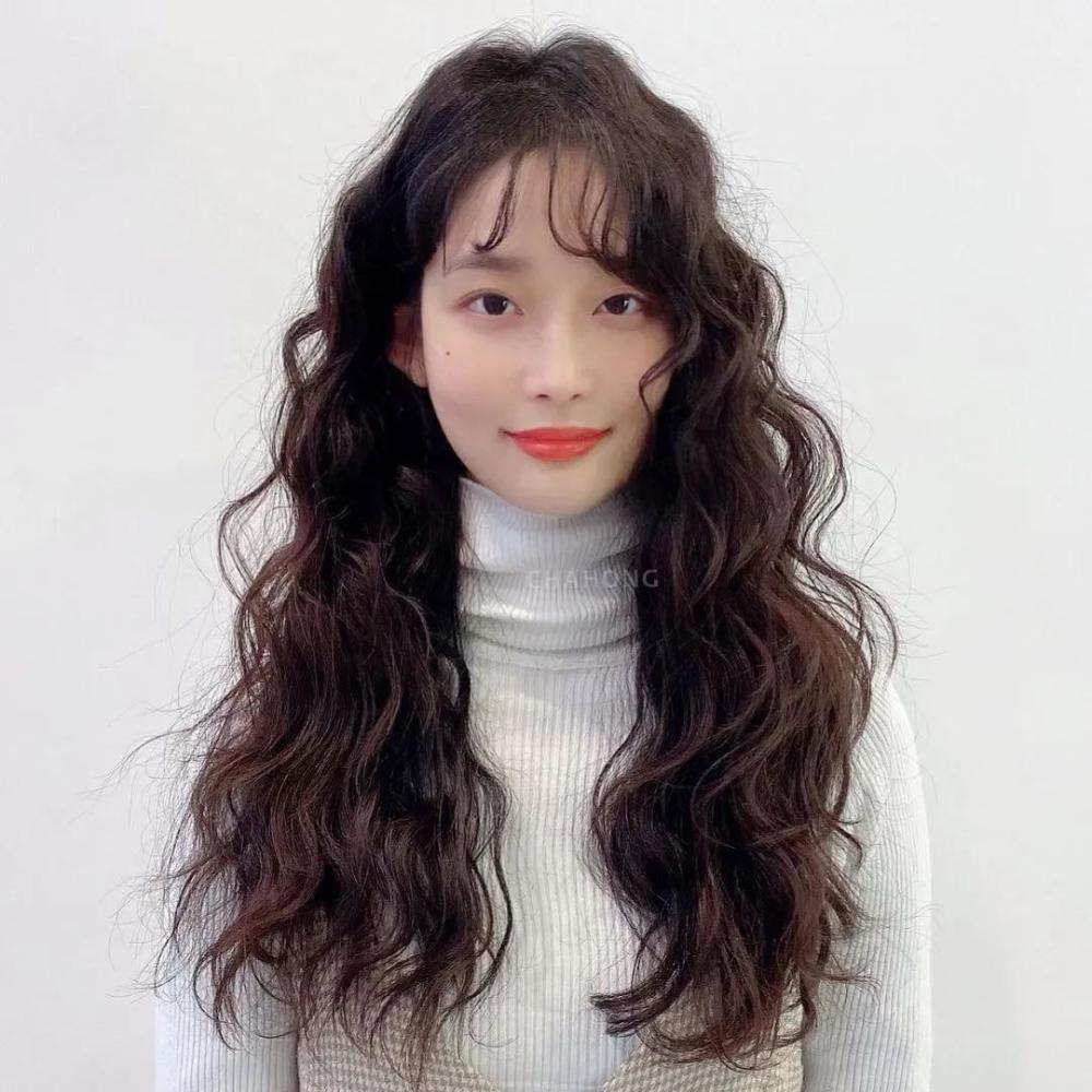 法式羊毛卷属于中小卷,和传统的螺丝头不同,这种卷型更随意也更自然