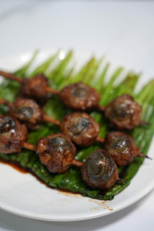 广西百色必吃的特色美食,爆浆烤猪眼,你吃过吗?