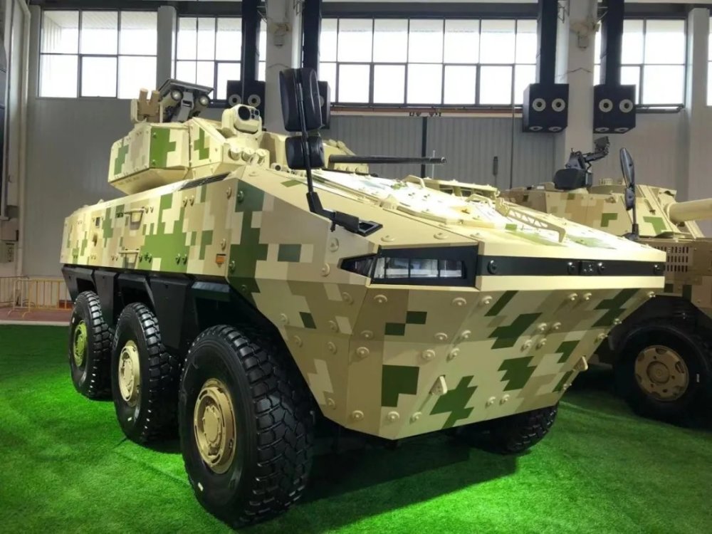 中国重型步兵战车亮相!战斗全重50吨,装无人炮塔,防御超坦克_腾讯新闻