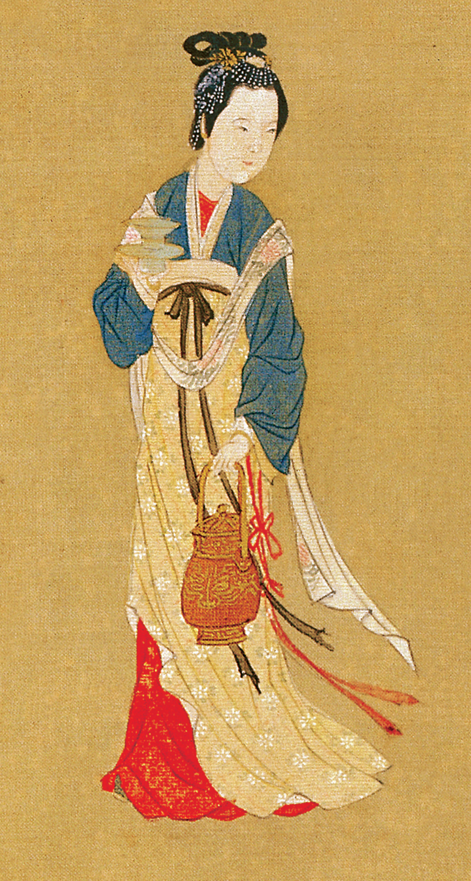 南北朝时胡汉文化交融,衣裳由收窄的款式,逐渐演变成为襦裙