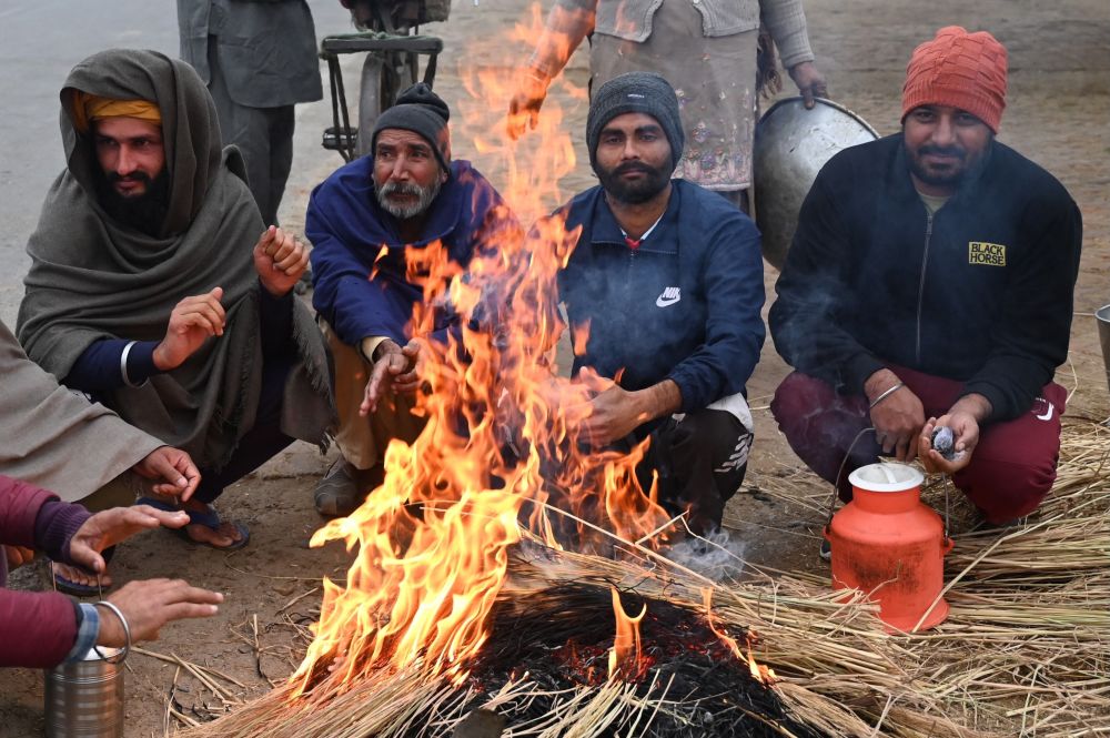 (外代一线)烤火取暖_腾讯新闻