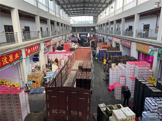 新春走基层长沙红星全球农批中心春节前水果蔬菜供销两旺