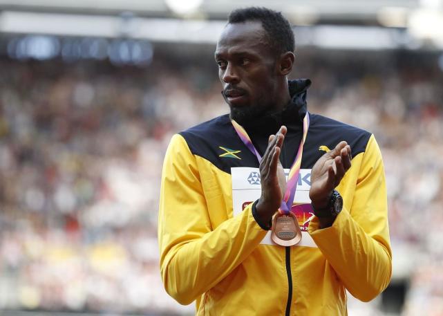 男子百米颁奖博尔特加特林亲切互动