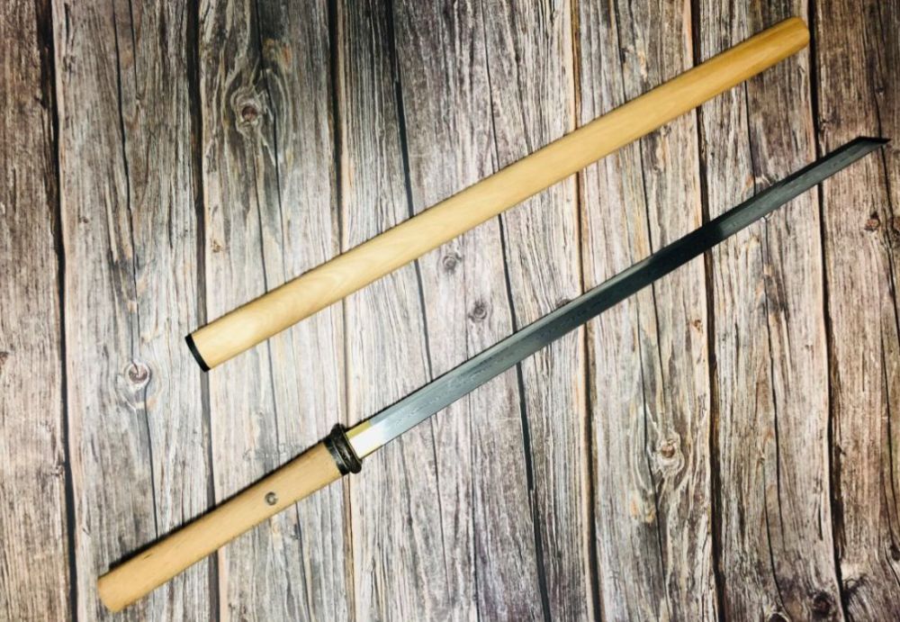 简单才是真绝色素雅简单的白木唐刀