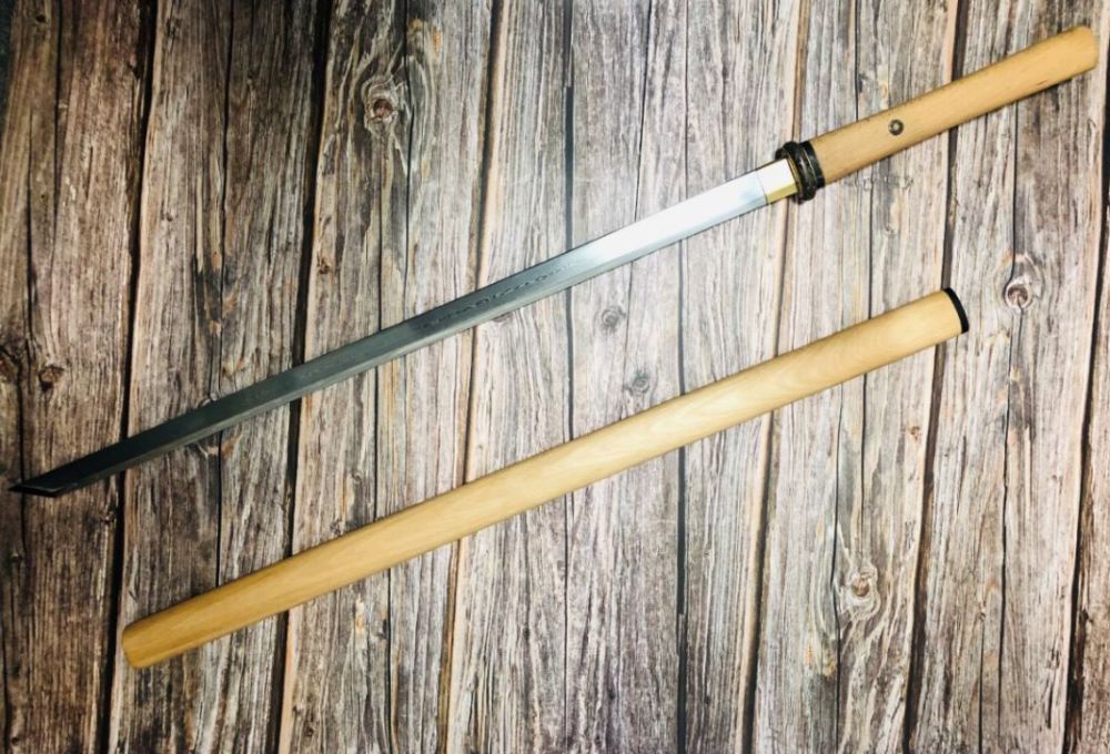 简单才是真绝色素雅简单的白木唐刀