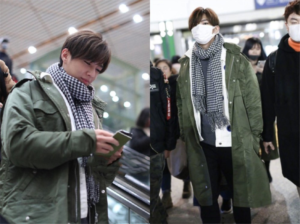 炎亚纶现身机场,绿色棉袄配格纹围巾,品味不减