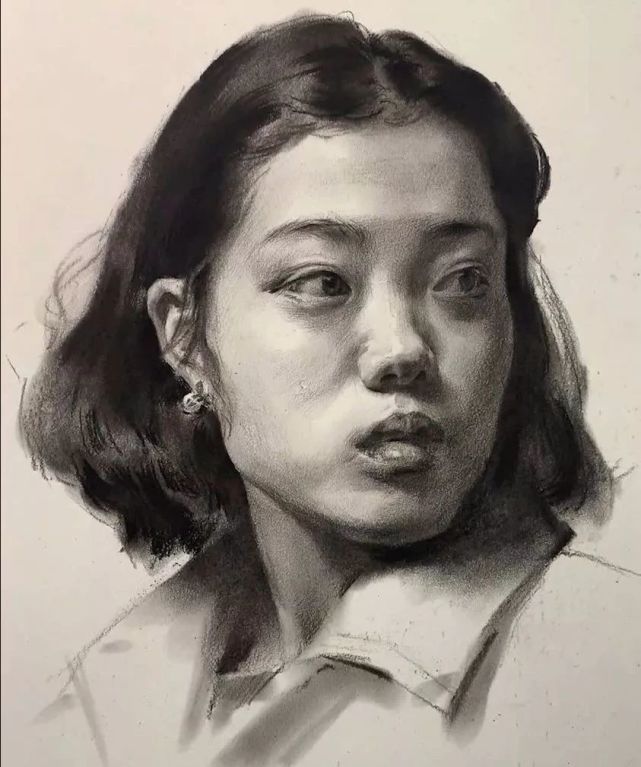 教你畫有扭頭動態的短髮女青年素描頭像