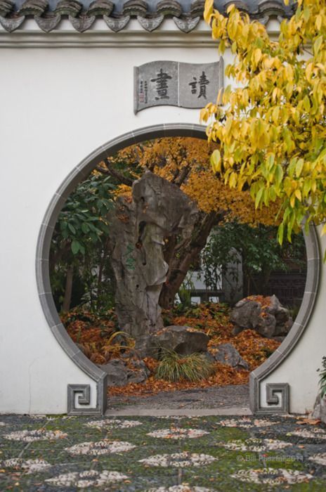 宝葫芦如意海棠花园林中的门可真美啊图