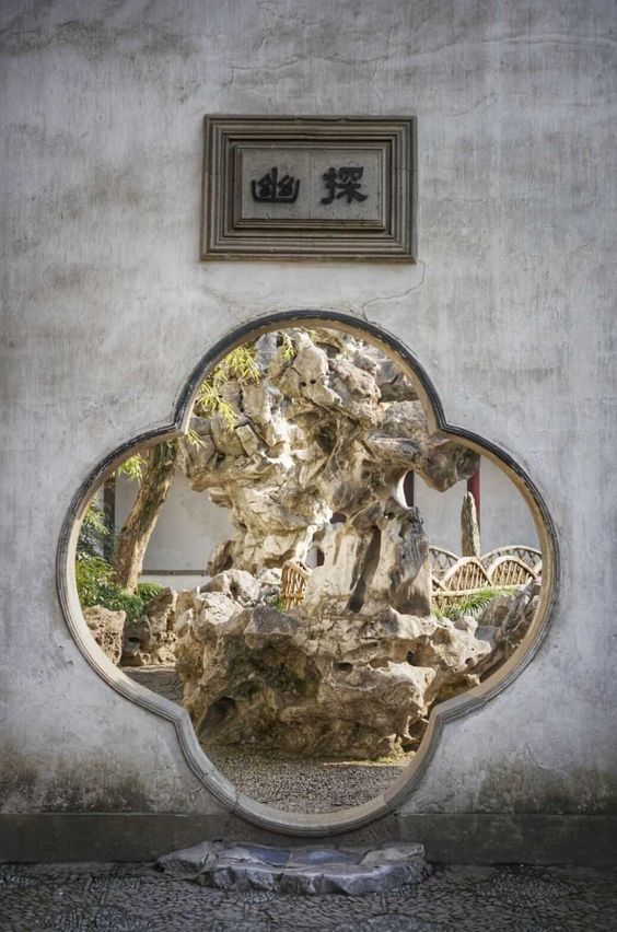 宝葫芦如意海棠花园林中的门可真美啊图