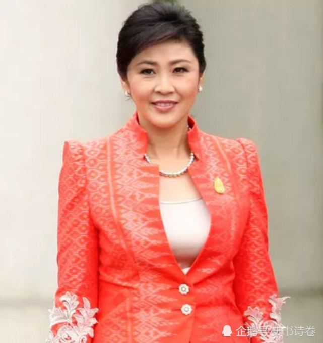 泰国第一美女英拉和默克尔的会面:英拉穿红装扎马尾,俏皮可爱!