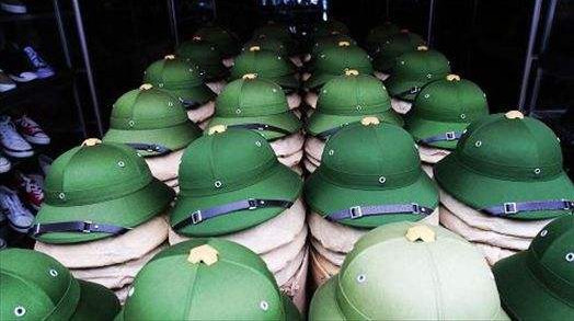 越南男子为何戴绿色帽子