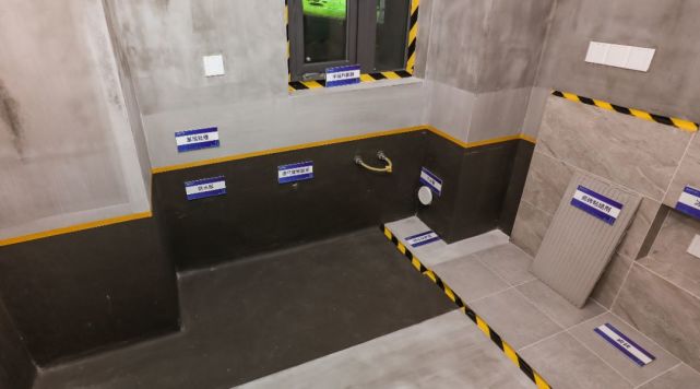 厨房工艺实景图卫生间墙体下方设置混凝土反坎,墙面四面防水层,天棚