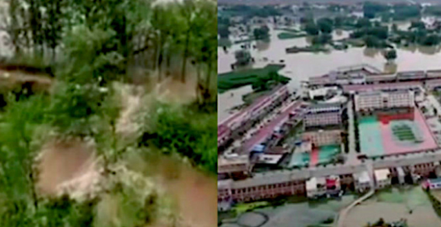 航拍：安徽六安一河堤溃口多个村和中小学被淹 农田和房屋泡水中