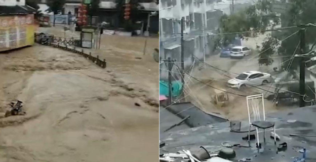 贵州三都遭暴雨袭击街道变河道 多车被洪水冲走交警路上捞冰柜
