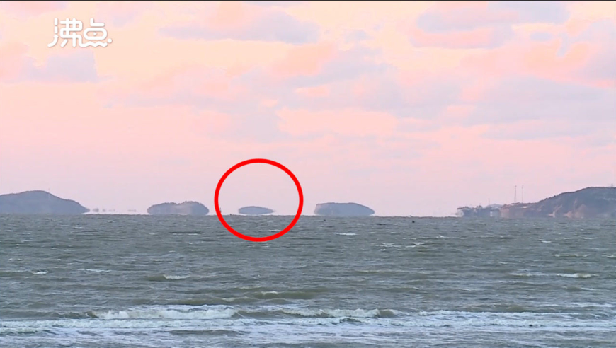 蓬莱海域现海滋奇观 海中小岛不断变幻宛如科幻大片