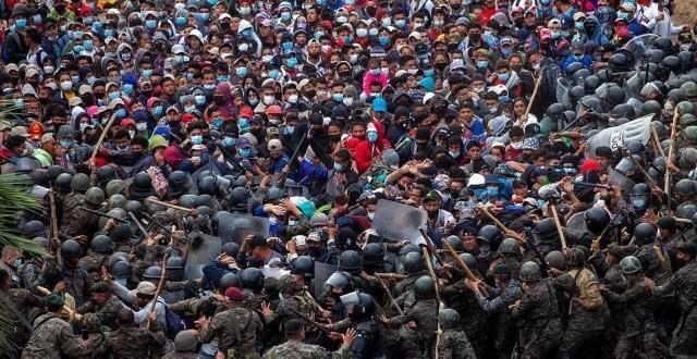 数千难民涌入美国,非法移民为何是洪都拉斯另一种形式的讨债