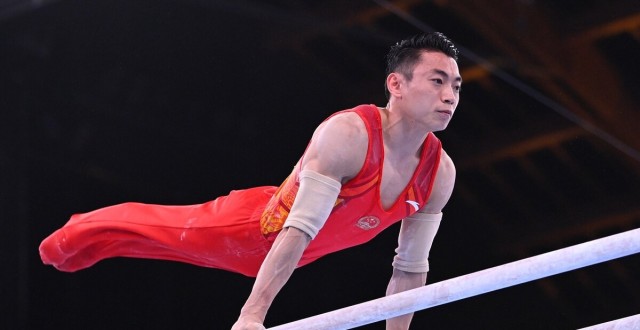 谌龙不敌阿塞尔森屈居亚军,三战奥运金银铜齐了举重李雯雯破纪录夺冠