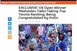 بوتين يهنئ ميدفيديف بفوزه!