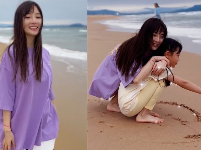 李小璐带女儿海边游玩,甜馨沙滩上画爱心送妈妈,甜蜜相拥好温馨