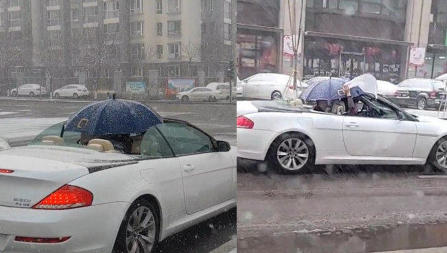 下雪天敞篷跑车打着伞去修车,网友笑哭:这和我的三蹦子有啥区别