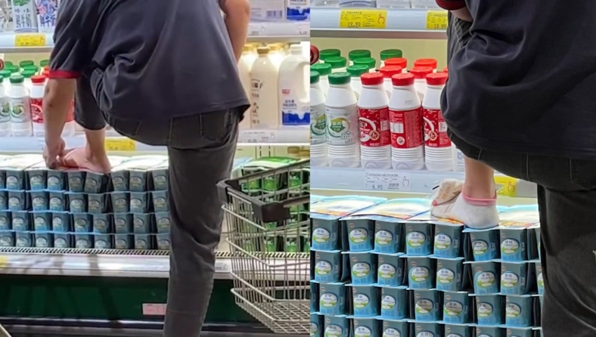 超市导购脚踩酸奶脱袜子,用袋装奶敷脚,超市:已将其开除并销毁货品