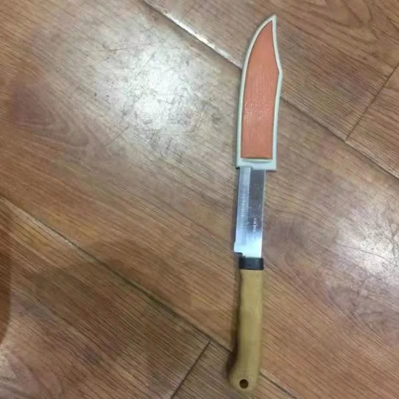 梅兴就是用这把刀扎伤了黄栋