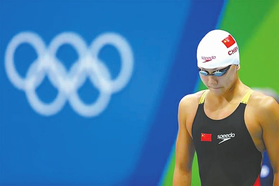 女子100米蝶泳比赛中获得冠军,并打破亚运会纪