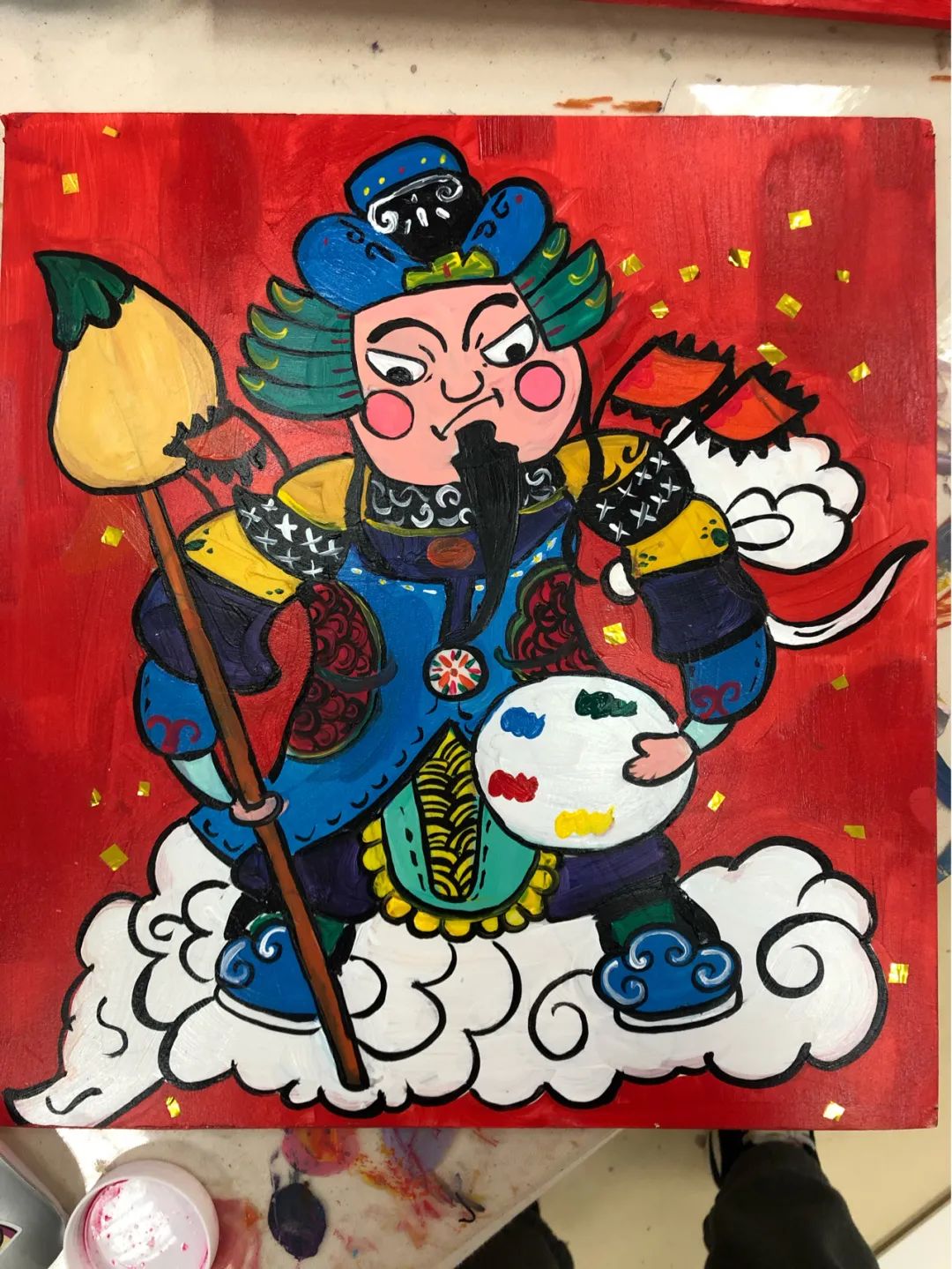到牛皮纸上作装饰 使得画面更加丰富 最后我们再写出主题字"门神"