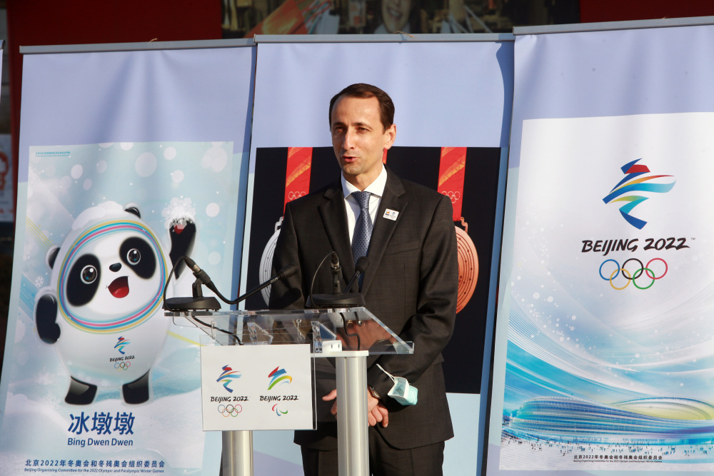 President of the Romanian Olympic and Sports Committee Mihai Covaliu speaks at the openning of a photo exhibition to welcome Beijing Winter Olympic Games in Bucharest, Romania, Nov. 22, 2021. (Photo by Gabriel Petrescu/Xinhua)