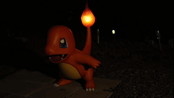 玩家利用3d打印技术制作了宝可梦中的小火龙还带它出门露营