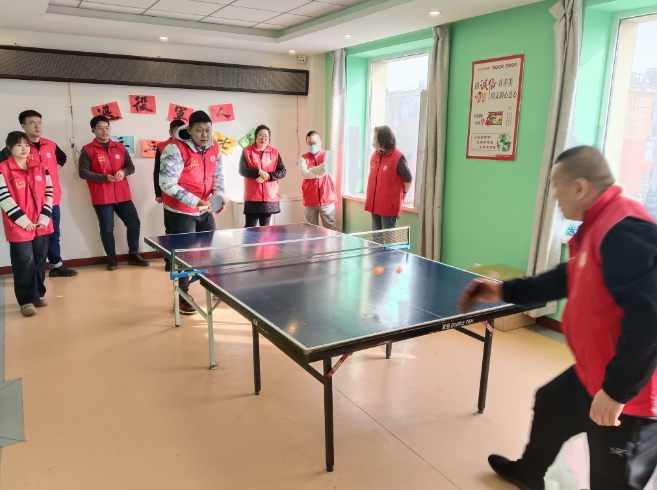 杨蒲社区联合多社区开展乒乓赛场展风采永葆本色争第一活动