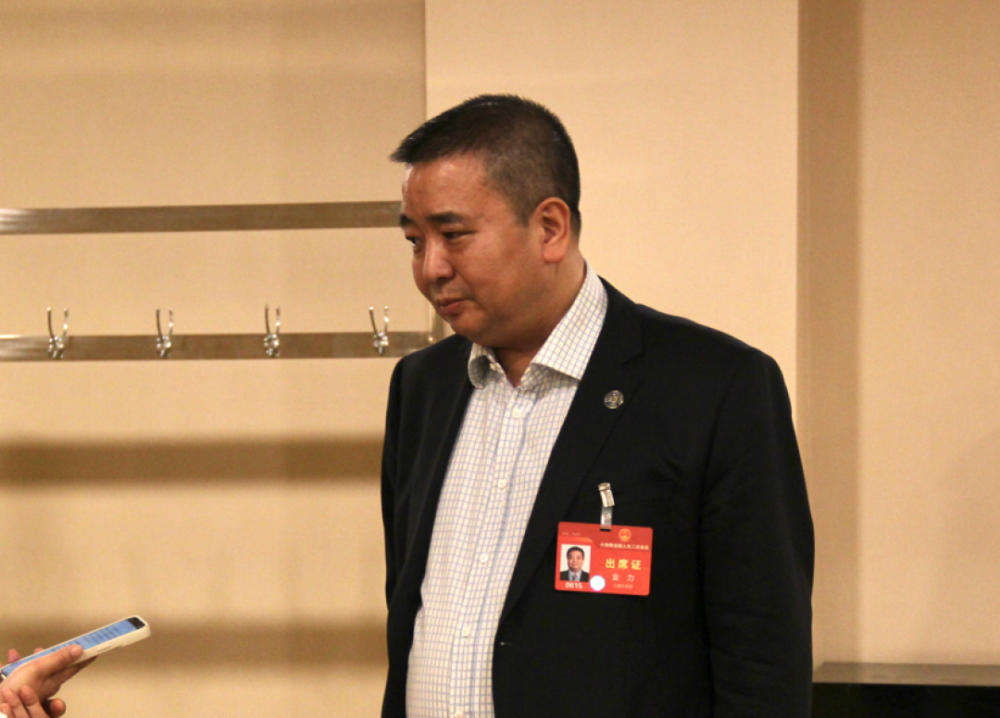 专访复旦大学校长金力教育的目标不是把人训练成做题家