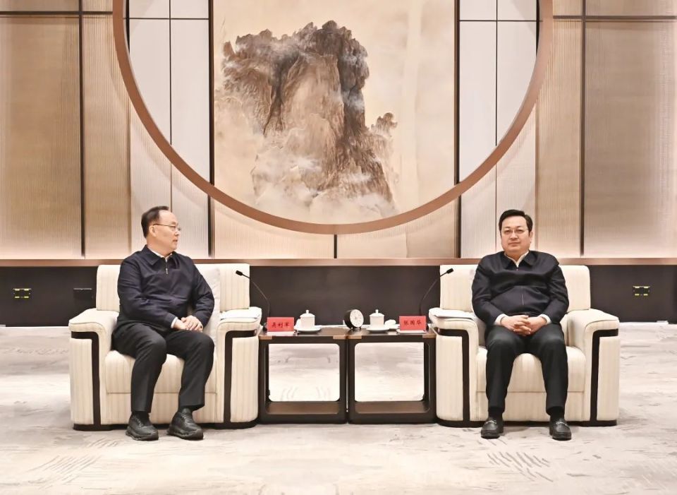 张国华与中国光大集团党委书记、董事长吴利军一行举行工作座谈