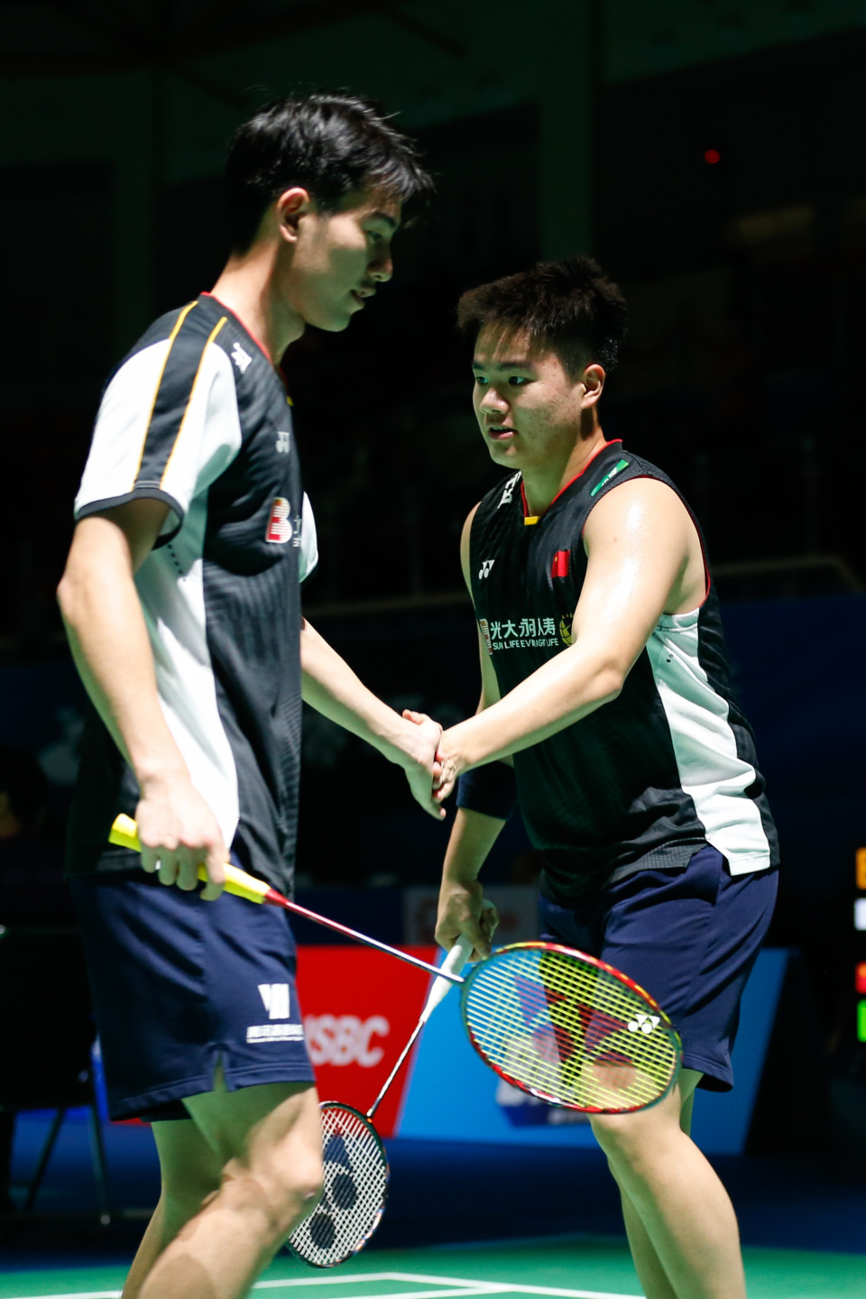 新华社记者 王益亮 摄7月18日,梁伟铿(左)/王昶在比赛中.