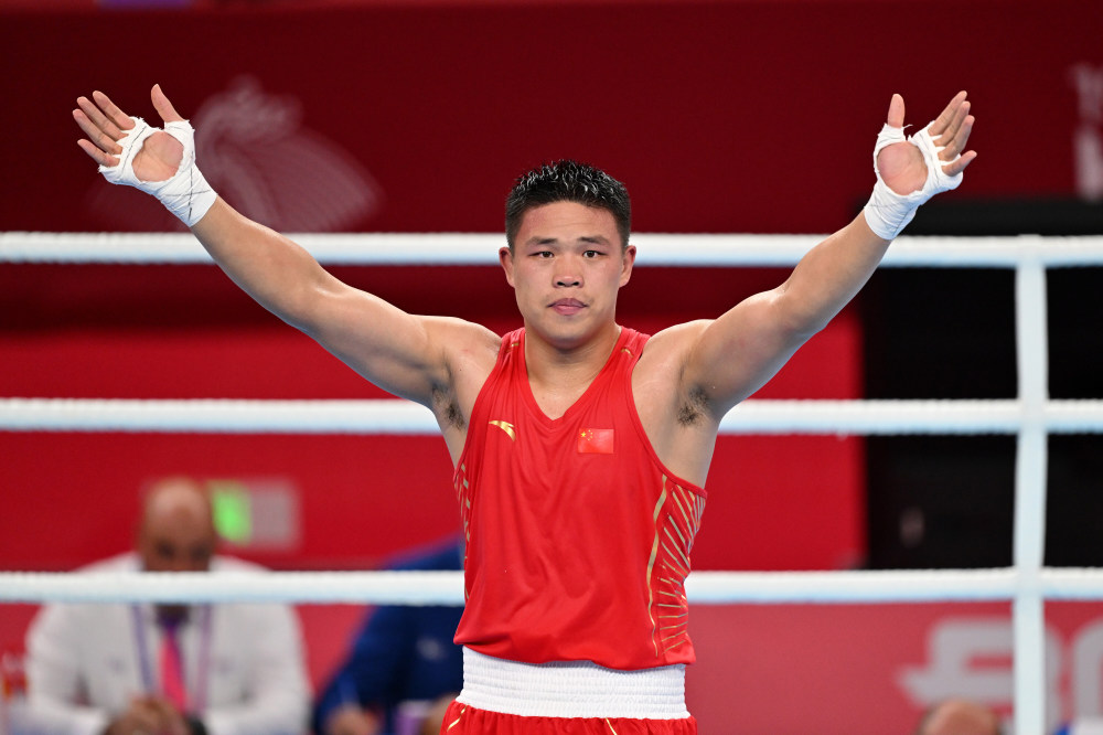 拳击男子92公斤级四分之一决赛韩雪振晋级